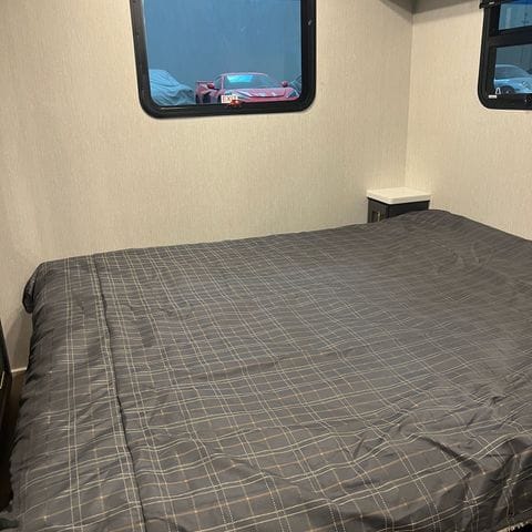 2027 Nexus Ghost 36DS bedroom window and nightstand - thumbnail