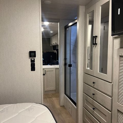 2027 Nexus Rebel 34R shower door and mirror cabinet - thumbnail