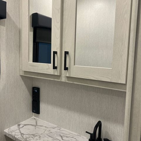 2027 Nexus Rebel 34R bathroom mirror cabinet and marble counter - thumbnail
