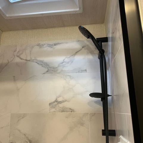 2027 Nexus Rebel 34R shower head detail - thumbnail