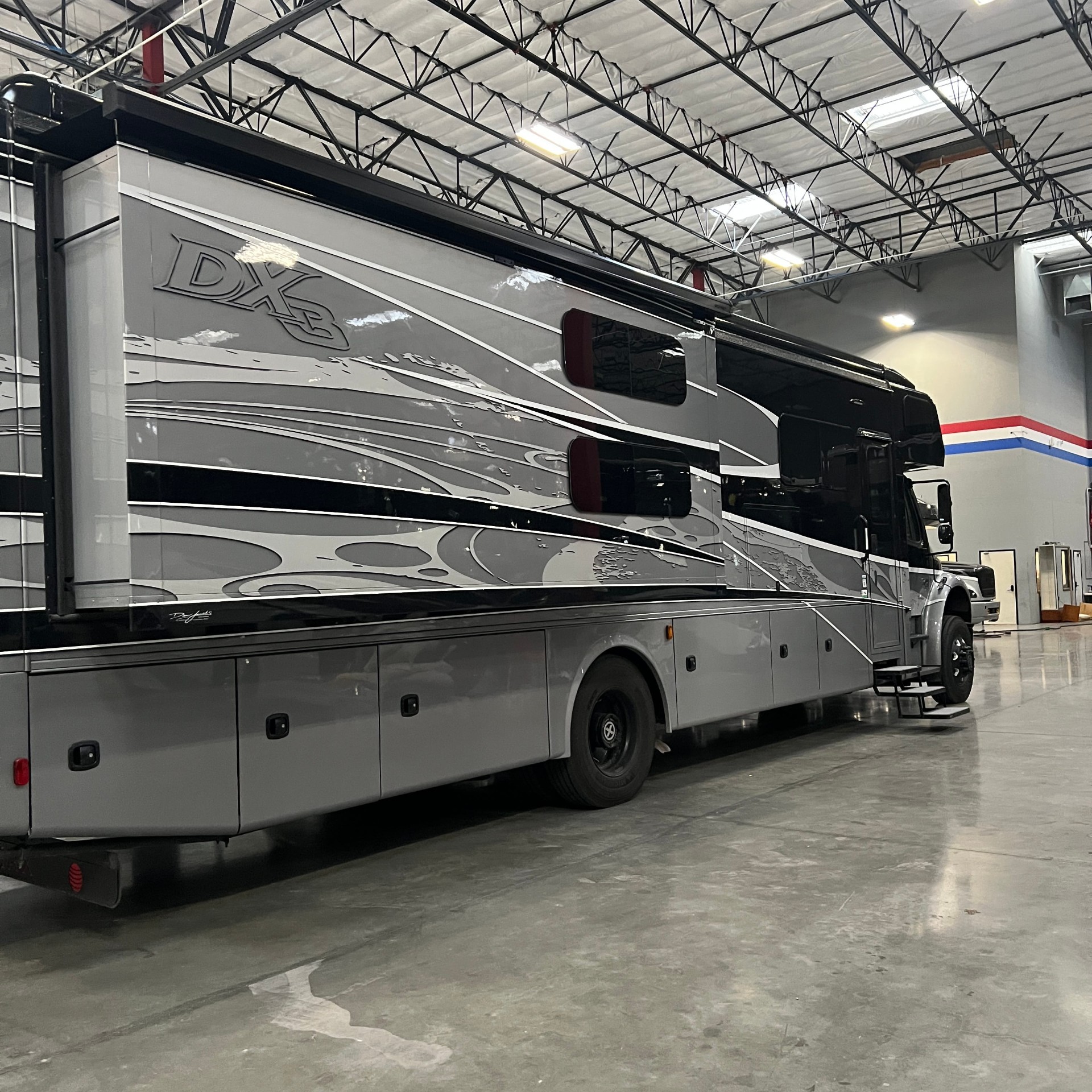 Exterior of the Dynamax DX3 37BD Super C motorhome on the Freightliner M2 chassis