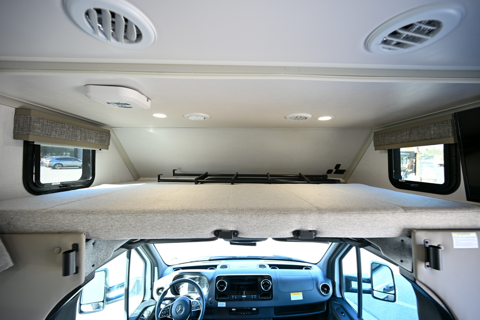 2025 Dynamax Isata 3 24FW cab over bunk sleeping area