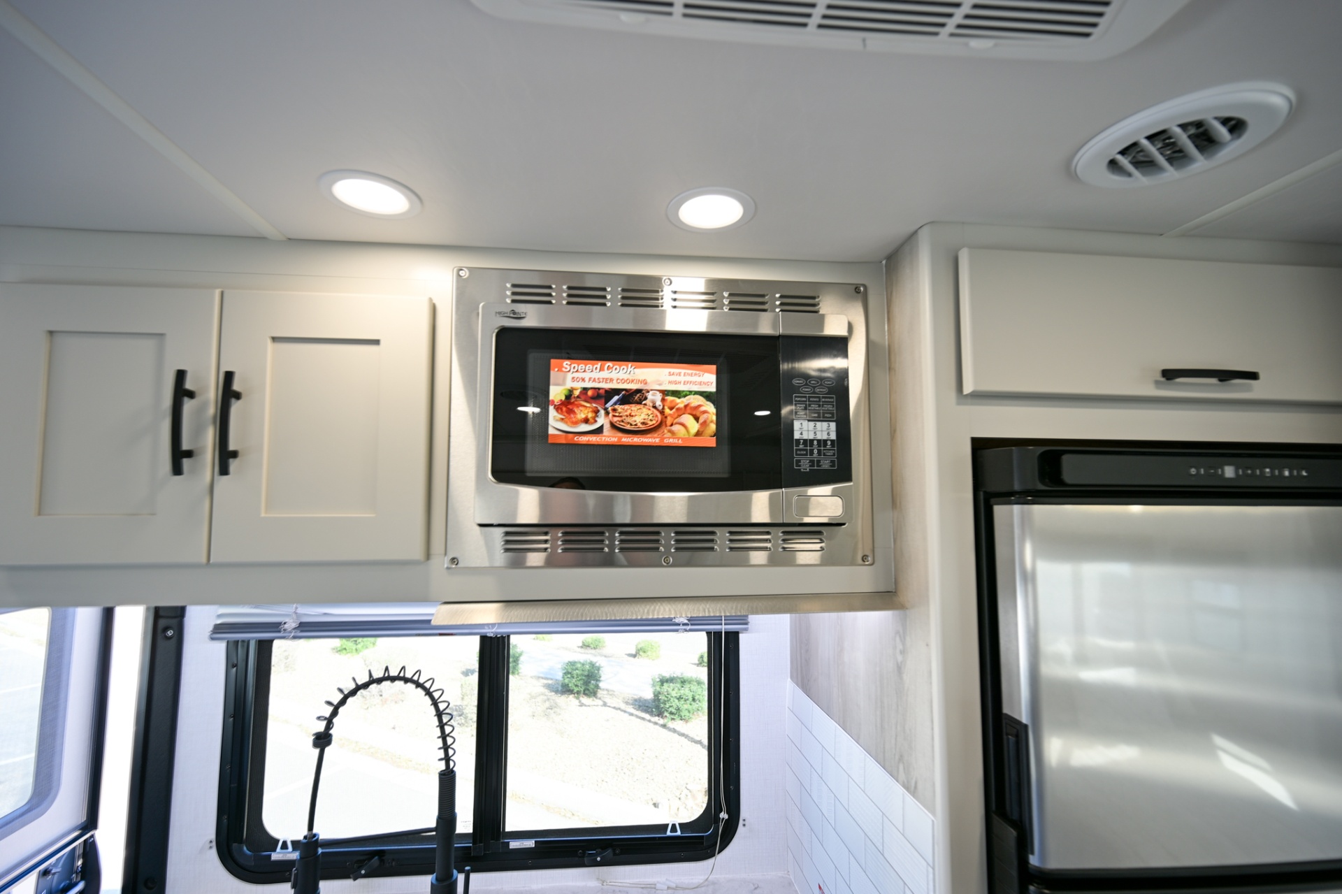 2025 Dynamax Isata 3 24FW convection microwave and cabinets