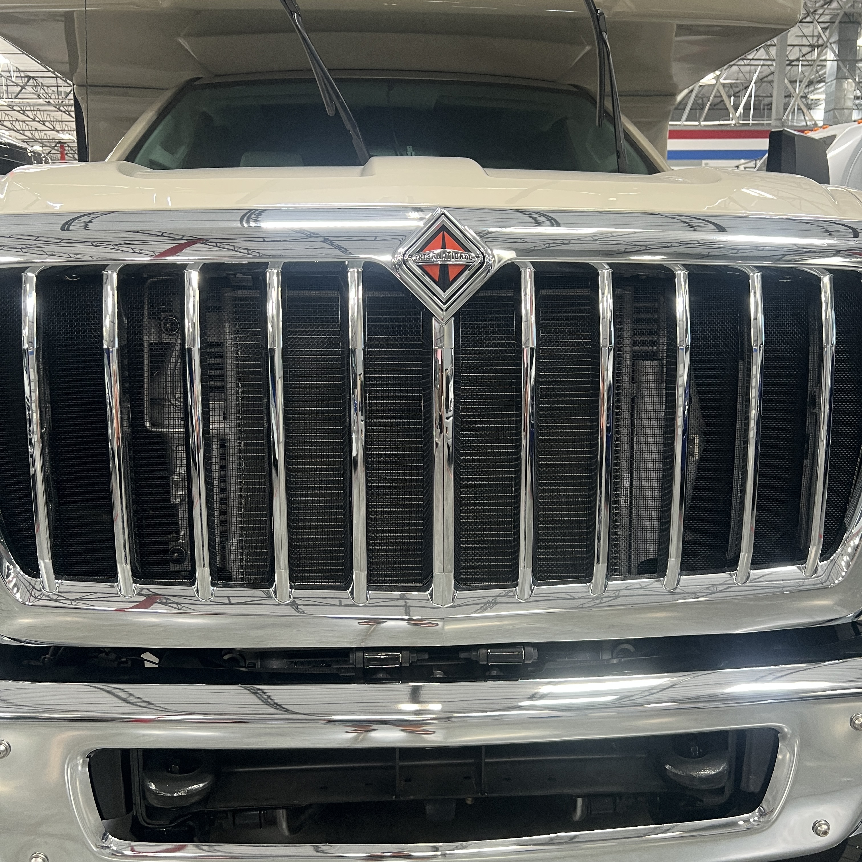 2027 Nexus Rebel Air 35R front grille showing the International badge